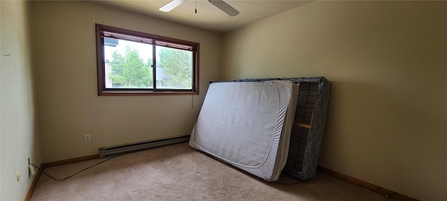 1335 Sparta Plz Unit 7, Steamboat Springs, CO 80487 - empty room with a baseboard radiator, carpet flooring, and a ceiling fan