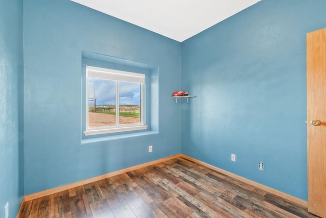 42450 Mcguire Ln, Hayden, CO 81639 - unfurnished room with baseboards and wood finished floors