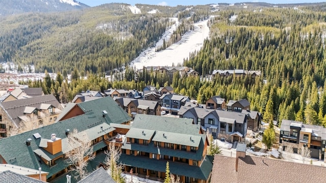 91 River Run Rd Unit 8117, Keystone, CO 80435 - drone / aerial view featuring a residential view, a view of trees, and a mountain view