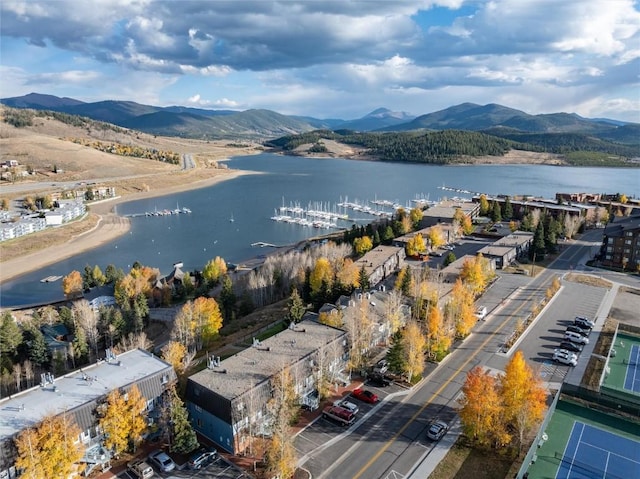 bird's eye view with a water and mountain view