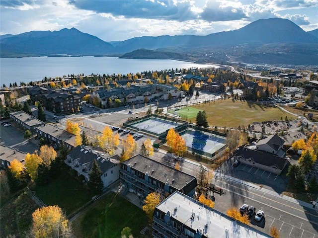 bird's eye view featuring a water and mountain view