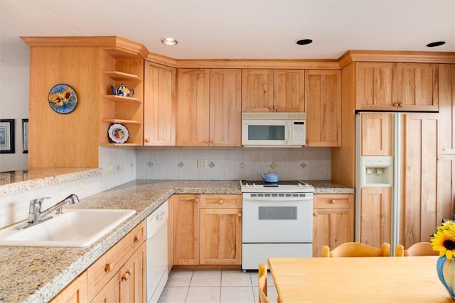 kitchen featuring open shelves, a sink, white appliances, light countertops, and backsplash