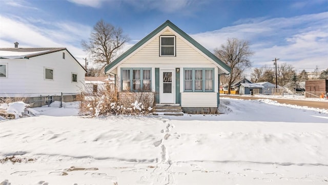 view of snow covered house