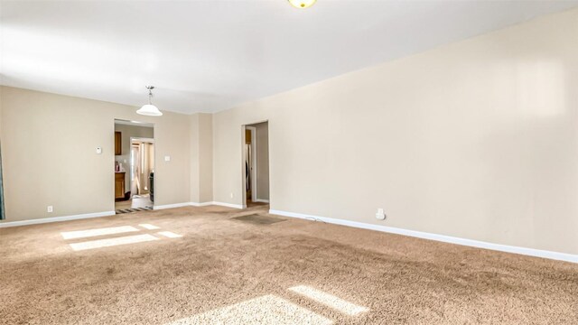 694 Russell St, Craig, CO 81625 - unfurnished room with light colored carpet and baseboards