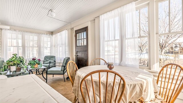 694 Russell St, Craig, CO 81625 - sunroom featuring tile patterned flooring