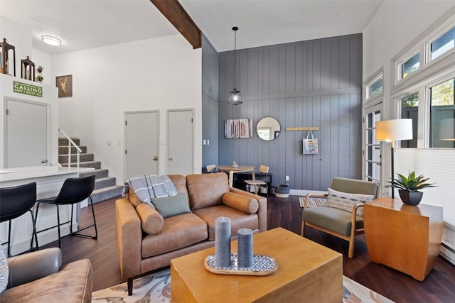 100 N Gold Flake Ter Unit A, Breckenridge, CO 80424 - living area with a high ceiling, wood finished floors, stairway, beamed ceiling, and wood walls