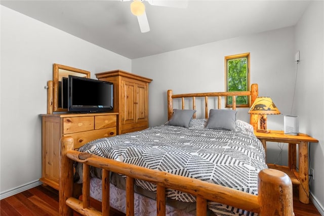 27358 Brandon Cir, Steamboat Springs, CO 80487 - bedroom with dark wood-style floors, baseboards, and ceiling fan
