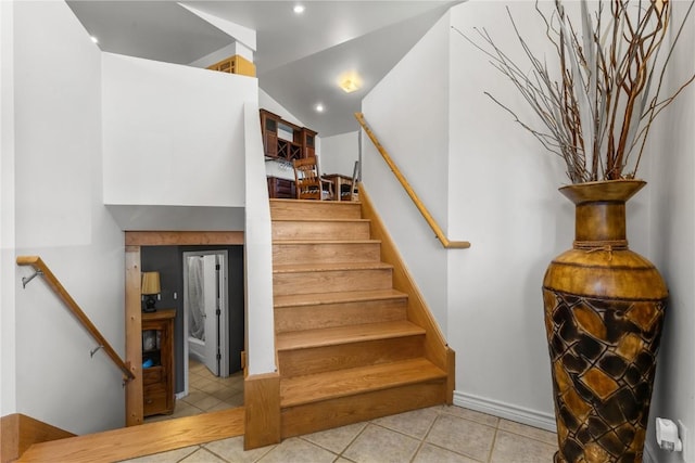 27358 Brandon Cir, Steamboat Springs, CO 80487 - stairway featuring tile patterned floors, recessed lighting, vaulted ceiling, and baseboards