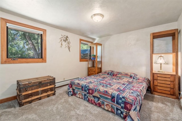 27125 Moonlight Way, Steamboat Springs, CO 80487 - bedroom with a baseboard radiator and carpet flooring