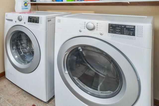 27125 Moonlight Way, Steamboat Springs, CO 80487 - laundry room featuring washing machine and dryer