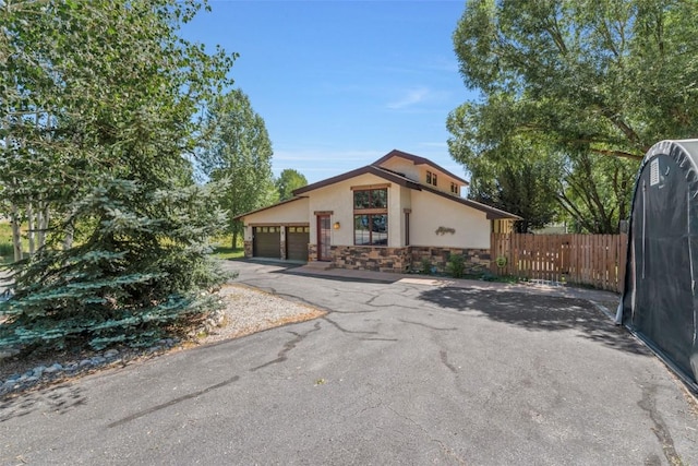 27125 Moonlight Way, Steamboat Springs, CO 80487 - view of front facade featuring stone siding and stucco siding