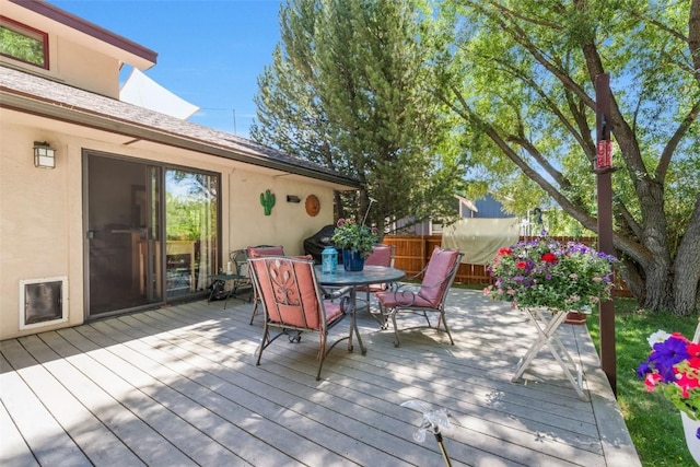 27125 Moonlight Way, Steamboat Springs, CO 80487 - wooden deck featuring outdoor dining area