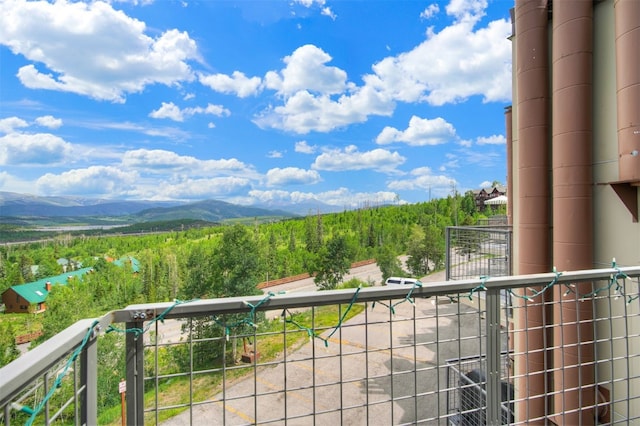 7031 Ryan Gulch Rd Unit 301, Silverthorne, CO 80498 - balcony with a mountain view and a forest view