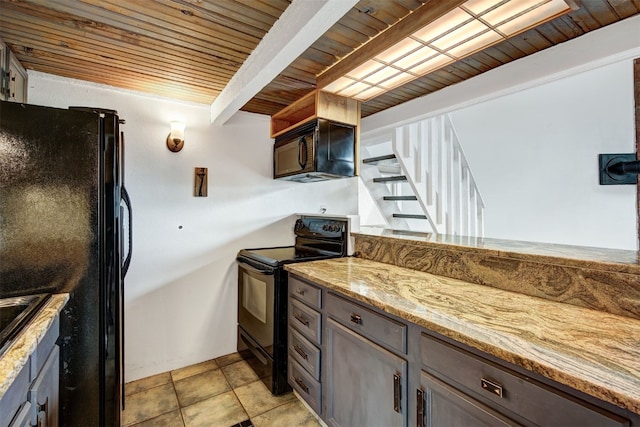 7031 Ryan Gulch Rd Unit 301, Silverthorne, CO 80498 - kitchen with black appliances, a wooden ceiling with exposed beams, light stone counters, and gray cabinets