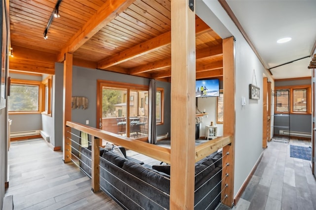 530 Tennis Club Rd Unit 1328, Keystone, CO 80435 - corridor with track lighting, baseboards, wood ceiling, and wood finished floors