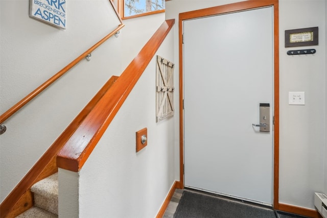 530 Tennis Club Rd Unit 1328, Keystone, CO 80435 - doorway to outside with a baseboard radiator and stairs