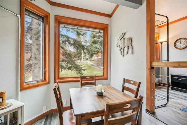 530 Tennis Club Rd Unit 1328, Keystone, CO 80435 - dining room with crown molding, baseboards, and wood finished floors