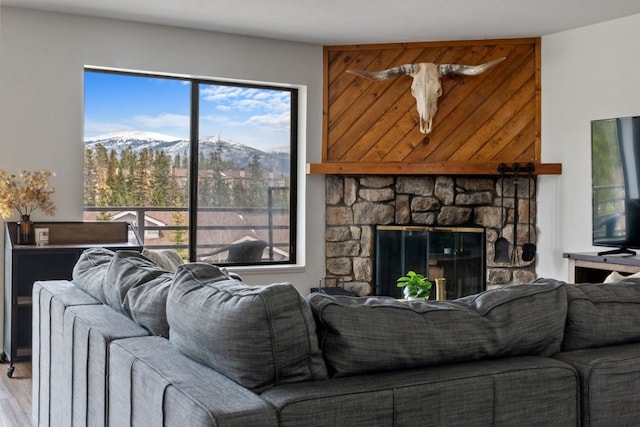 9876 Ryan Gulch Rd Unit 206, Silverthorne, CO 80498 - living area with a mountain view and light wood finished floors
