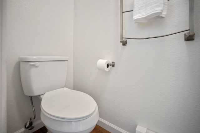 9876 Ryan Gulch Rd Unit 206, Silverthorne, CO 80498 - bathroom featuring baseboards and toilet