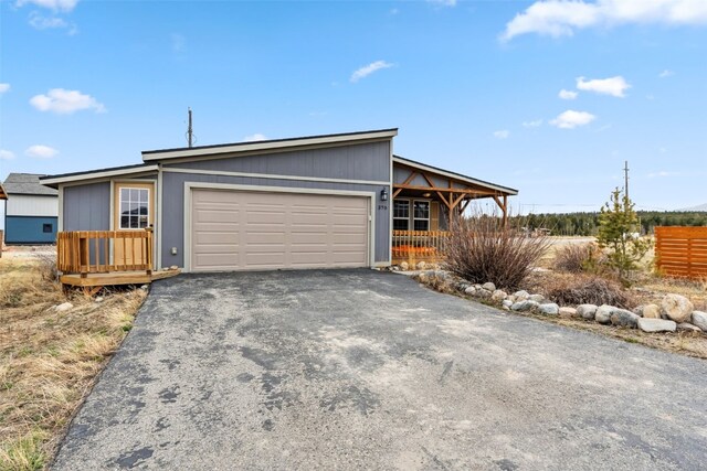 370 Stone Creek Dr, Fairplay, CO 80440 - view of front of property with an attached garage and driveway