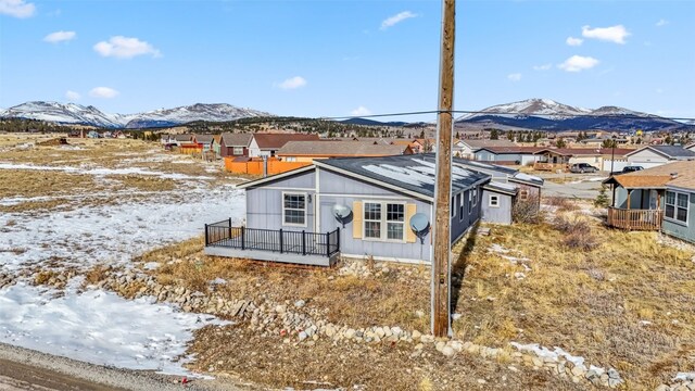 370 Stone Creek Dr, Fairplay, CO 80440 - snow covered rear of property with a residential view and a mountain view