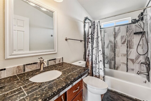 370 Stone Creek Dr, Fairplay, CO 80440 - bathroom with vanity, vaulted ceiling, shower / bath combo, and toilet