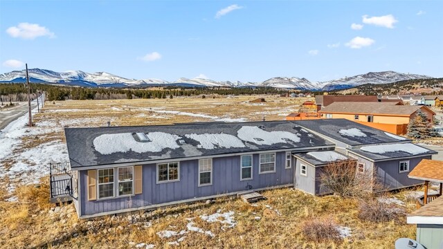 370 Stone Creek Dr, Fairplay, CO 80440 - view of front of house with a shingled roof and a mountain view