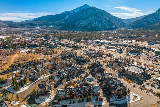 drone / aerial view featuring a mountain view