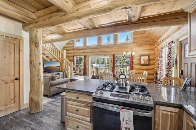 282 Sally Cir, Breckenridge, CO 80424 - kitchen with stainless steel range with gas stovetop, rustic walls, wooden ceiling, open floor plan, and dark wood-style floors