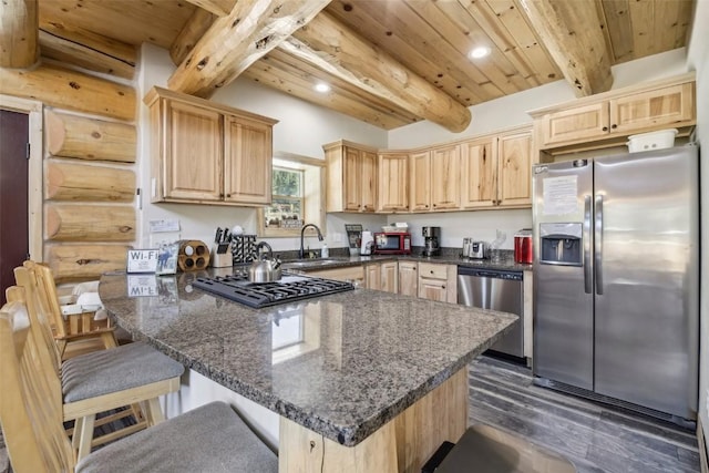 282 Sally Cir, Breckenridge, CO 80424 - kitchen featuring appliances with stainless steel finishes, light brown cabinetry, a sink, wood ceiling with exposed beams, and a peninsula
