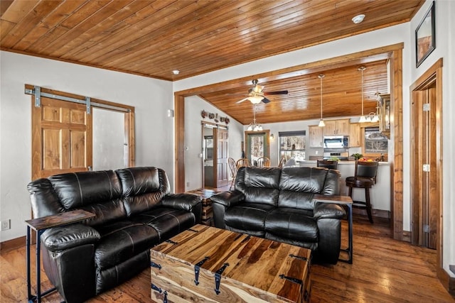 27100 Beaver Canyon Dr, Clark, CO 80428 - living area with wood ceiling, wood finished floors, baseboards, a ceiling fan, and a barn door