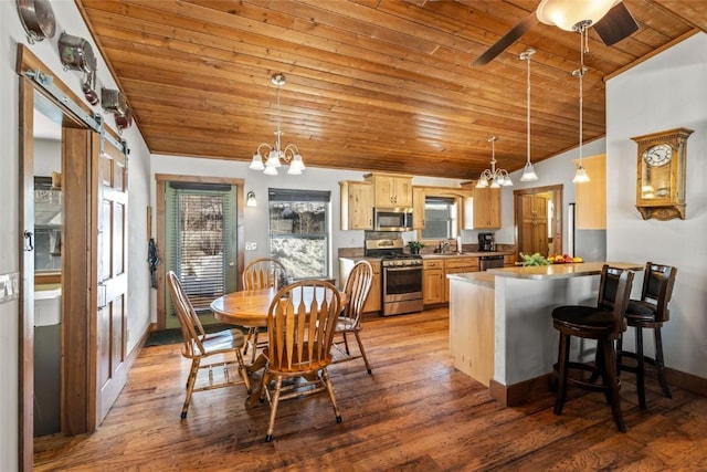 27100 Beaver Canyon Dr, Clark, CO 80428 - dining space with wooden ceiling, a chandelier, lofted ceiling, light wood-style flooring, and baseboards