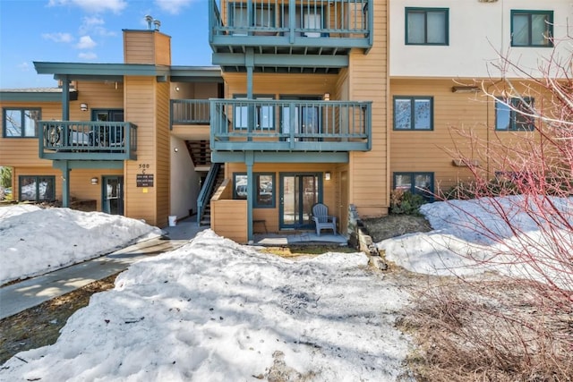 view of snow covered property