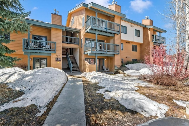 view of property with stairway