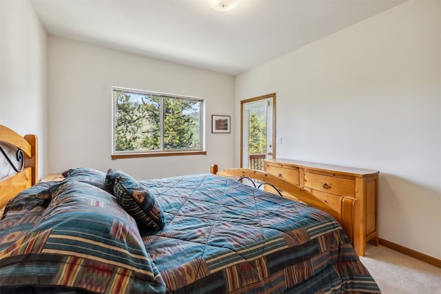 129 Lookout Ridge Dr Unit 129, Dillon, CO 80435 - bedroom featuring light colored carpet and baseboards