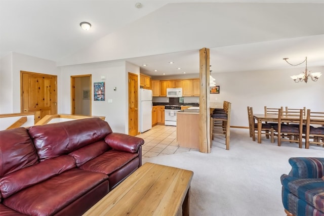 129 Lookout Ridge Dr Unit 129, Dillon, CO 80435 - living area with lofted ceiling, a chandelier, light colored carpet, and recessed lighting