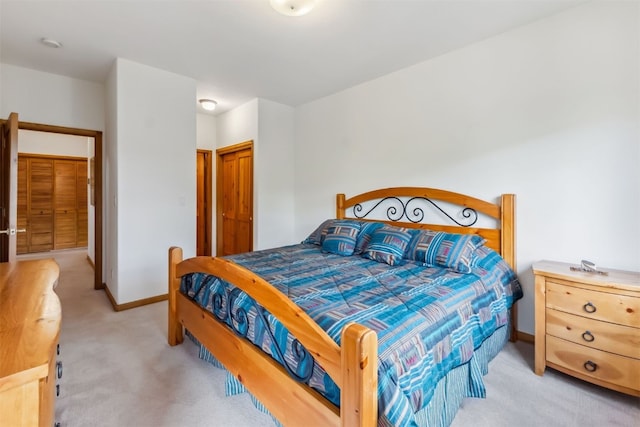 129 Lookout Ridge Dr Unit 129, Dillon, CO 80435 - bedroom with light colored carpet and a closet