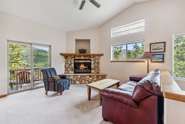 129 Lookout Ridge Dr Unit 129, Dillon, CO 80435 - carpeted living room featuring a ceiling fan, lofted ceiling, and a fireplace