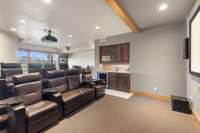 23 Verde Ct, Breckenridge, CO 80424 - home theater room with wine cooler, bar with sink, light carpet, recessed lighting, and baseboards