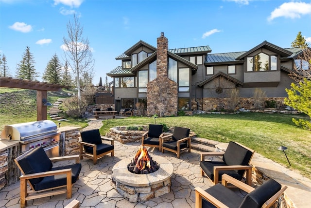 23 Verde Ct, Breckenridge, CO 80424 - view of patio / terrace featuring an outdoor fire pit