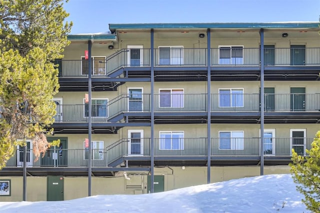 view of snow covered property