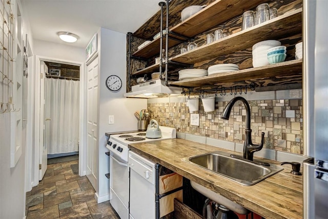 kitchen featuring a sink, tasteful backsplash, butcher block countertops, open shelves, and white range with electric cooktop