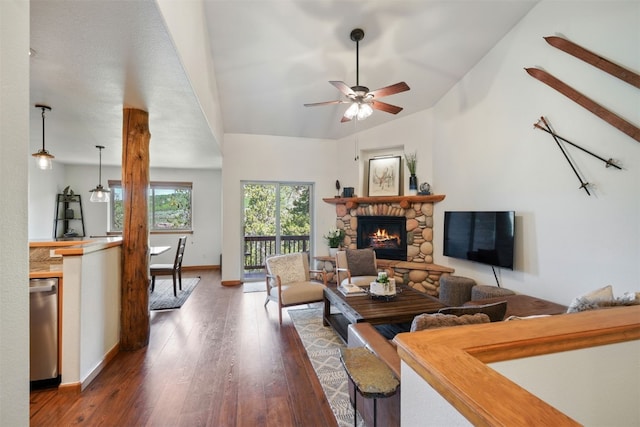 113 Lookout Ridge Dr, Dillon, CO 80435 - living room with hardwood / wood-style flooring, a stone fireplace, a ceiling fan, and lofted ceiling