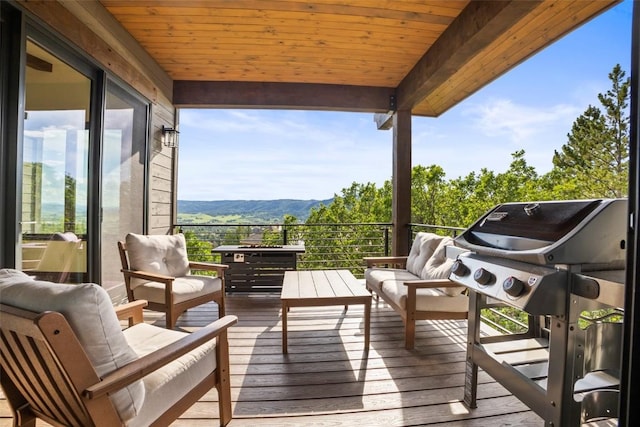 2355 Poma Ln Unit 2355, Steamboat Springs, CO 80487 - deck with a mountain view, area for grilling, and an outdoor living space