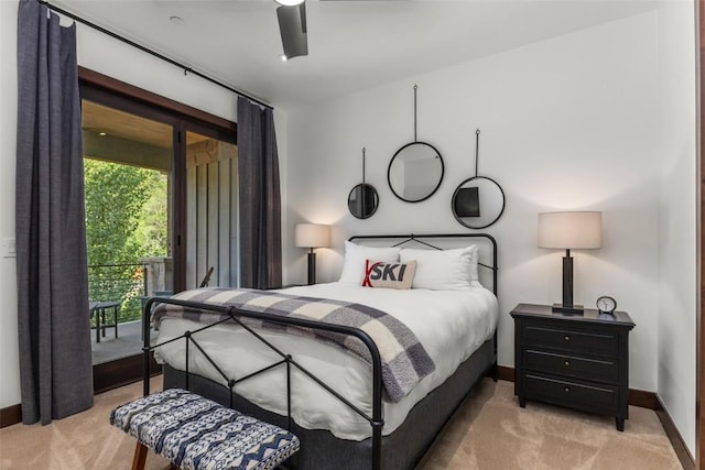 2355 Poma Ln Unit 2355, Steamboat Springs, CO 80487 - bedroom with light colored carpet, baseboards, access to exterior, and a ceiling fan