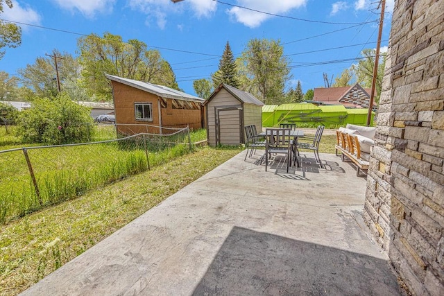 527 E Lincoln Ave, Hayden, CO 81639 - fenced backyard with outdoor dining area and a patio
