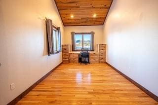 527 E Lincoln Ave, Hayden, CO 81639 - unfurnished room featuring baseboards, light wood-type flooring, wooden ceiling, and high vaulted ceiling