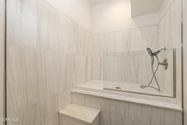 671 Vasquez Rd, Winter Park, CO 80482 - bathroom featuring tiled shower
