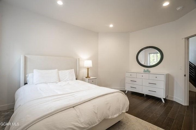 671 Vasquez Rd, Winter Park, CO 80482 - bedroom with baseboards, dark wood-type flooring, and recessed lighting
