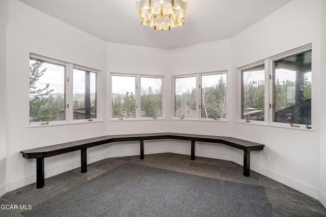 671 Vasquez Rd, Winter Park, CO 80482 - unfurnished office with a chandelier and baseboards